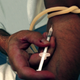 A Detroit man injects an advance sample of Zom-B. CIA officials expect the new drug to be even more popular than crack.